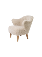 Compact Lounge Chair in Sheepskin Sculptural Armrests