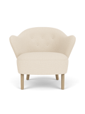 Compact Lounge Chair in Textile Sculptural Armrests