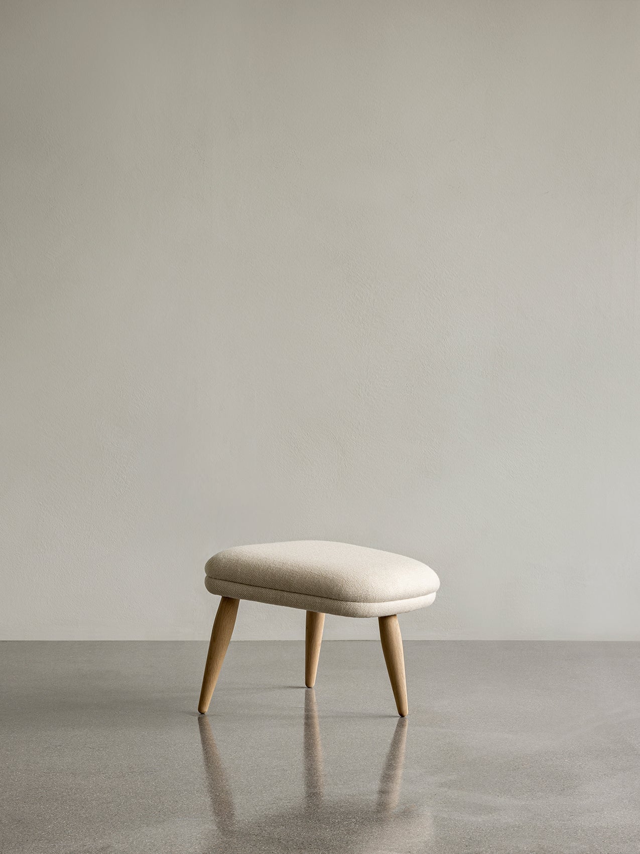 Lounge Ottoman Embracing Form, Pairs with Lounge Chair, Oak or Walnut
