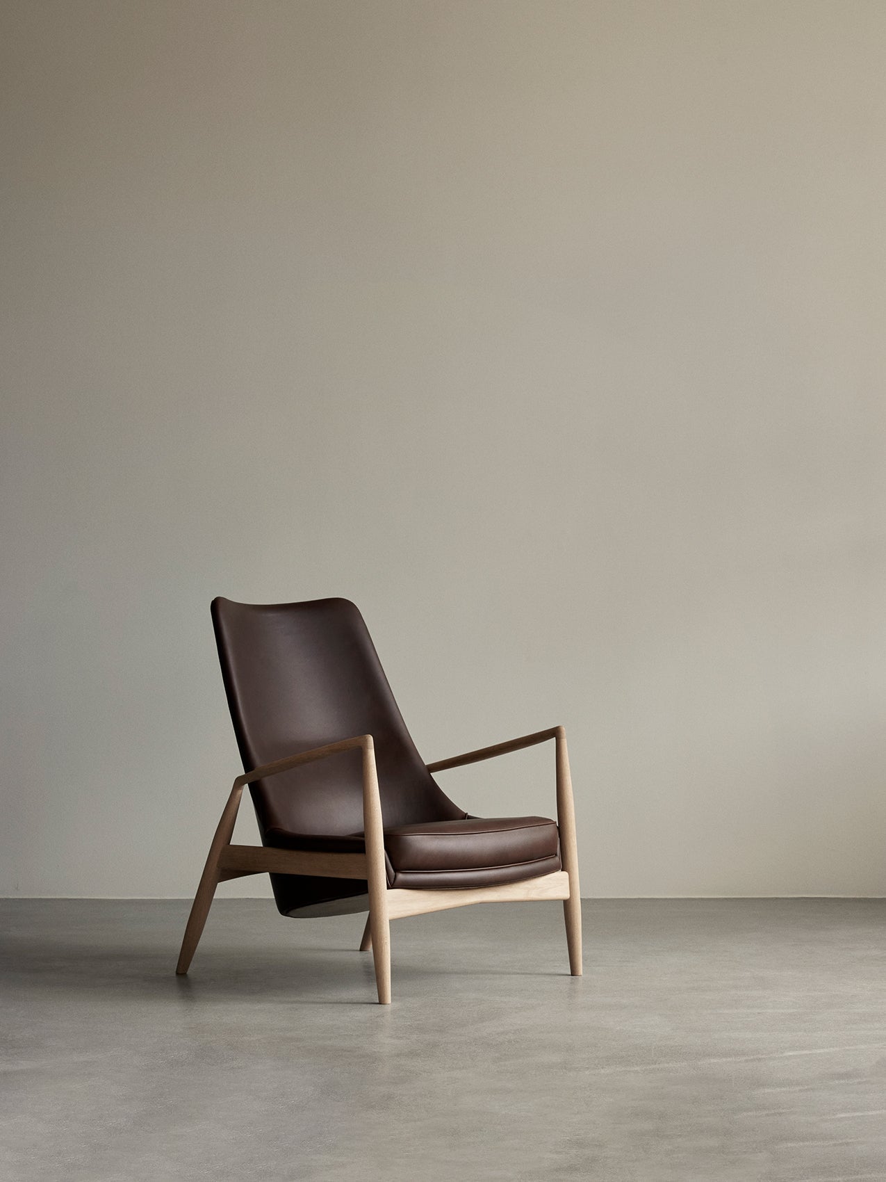 High Back Lounge Chair Angled Frame, Leather Upholstery, Floating Shell