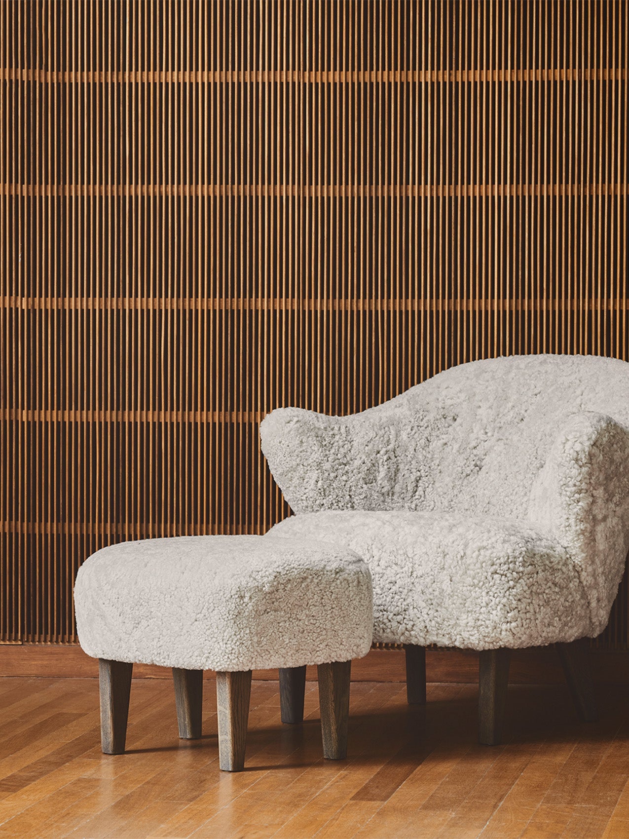 Compact Lounge Chair in Sheepskin Sculptural Armrests